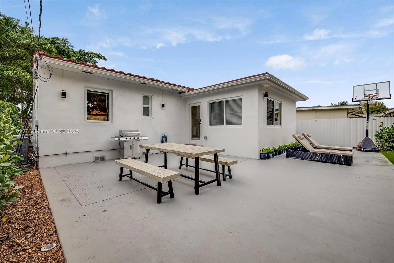 2969 Southwest 20th Street Miami, FL 33145 - Photo 24 of 28 a view of a house with backyard and sitting area