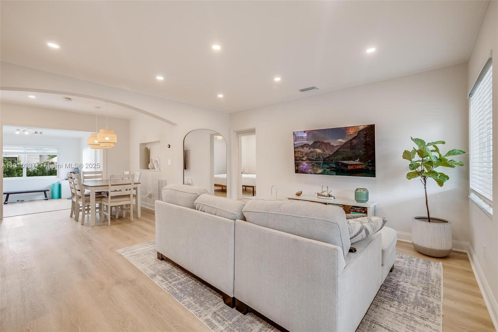 2969 Southwest 20th Street Miami, FL 33145 - Photo 5 of 28 a living room with furniture and a flat screen tv