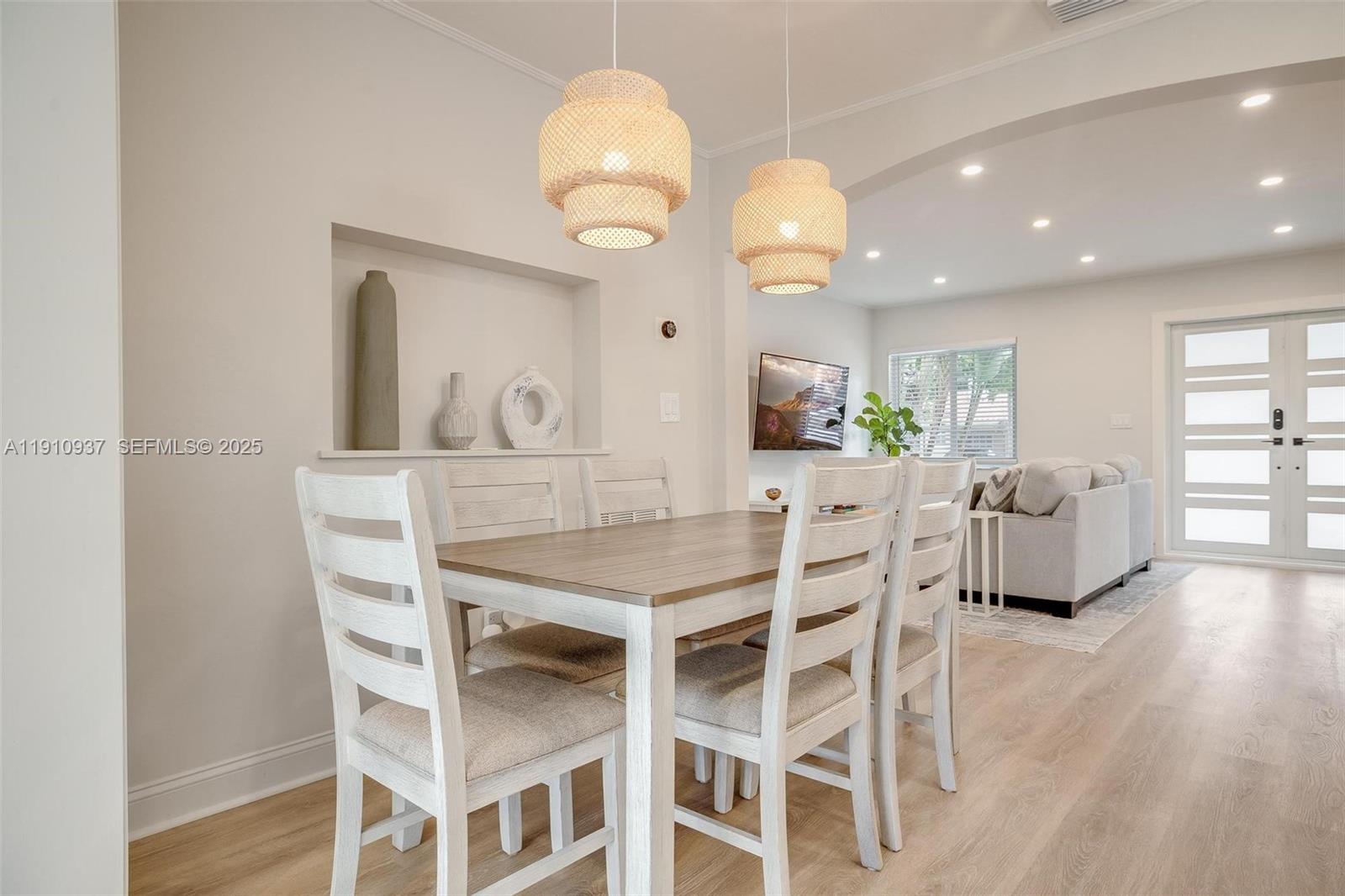 2969 Southwest 20th Street Miami, FL 33145 - Photo 6 of 28 a view of a dining room with furniture and wooden floor