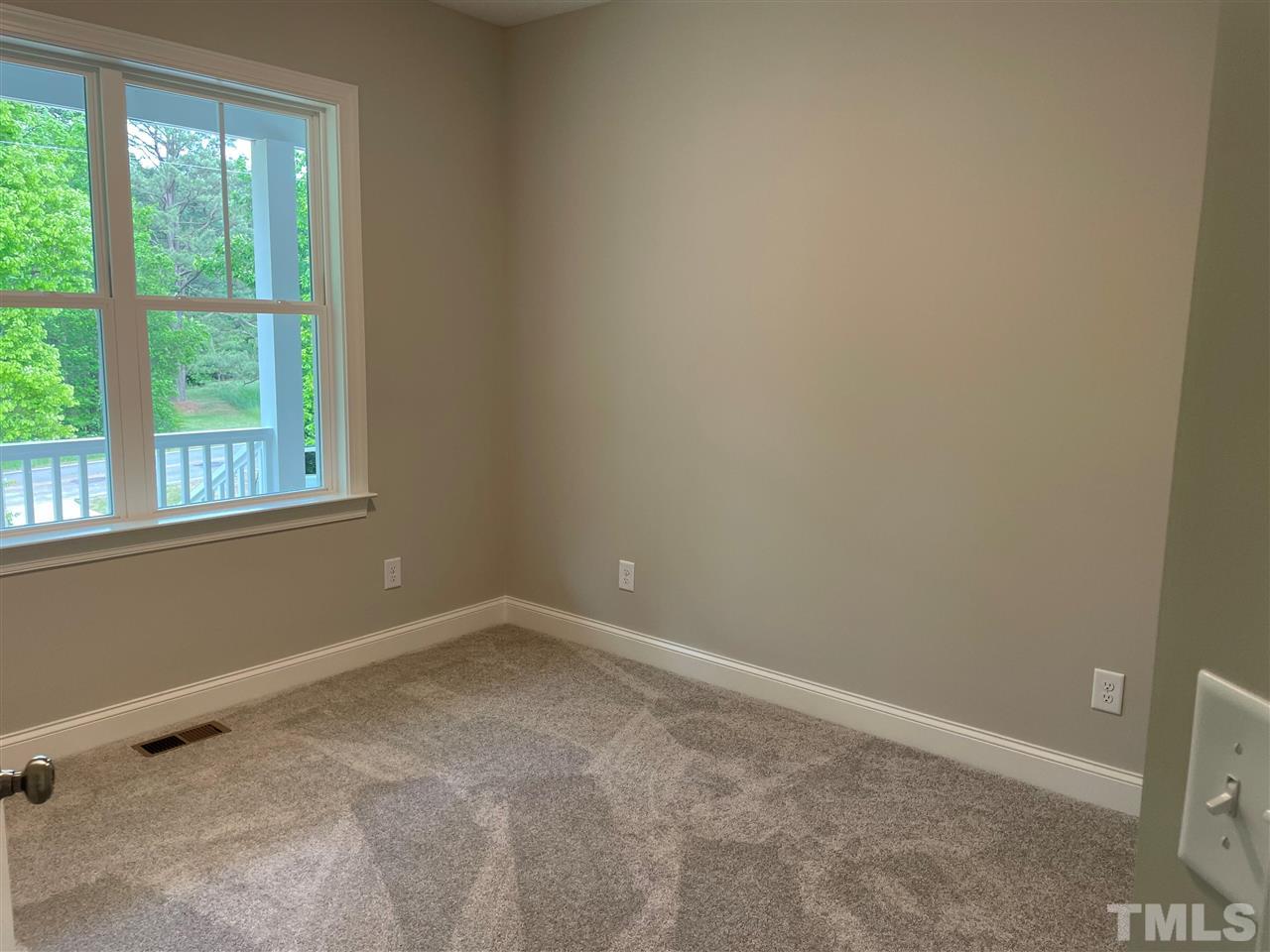 1820 Bryantown Road Spring Hope, NC 27882 - Photo 16 of 23 an empty room with a window