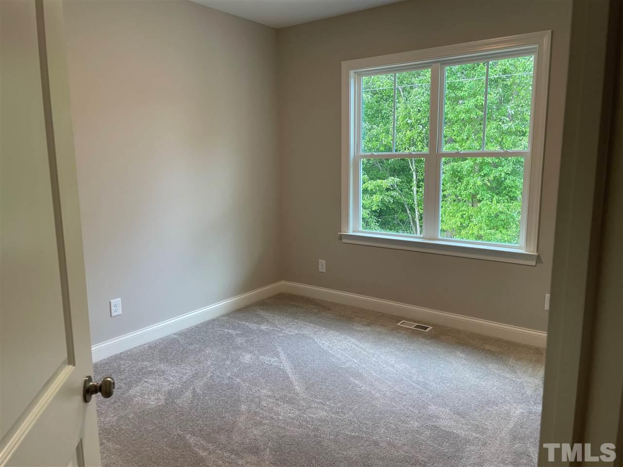 1820 Bryantown Road Spring Hope, NC 27882 - Photo 17 of 23 an empty room with a window