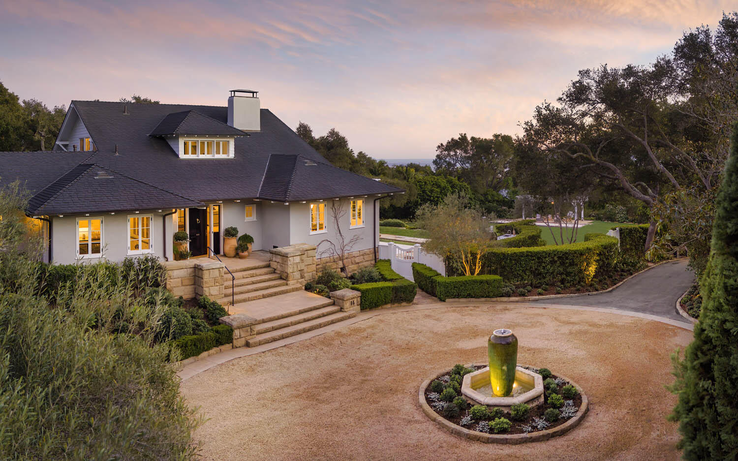 830 Riven Rock Road Montecito, CA 93108 - Photo 3 of 36 a front view of a house with garden