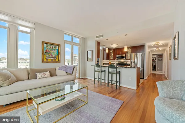 a living room with furniture and a table