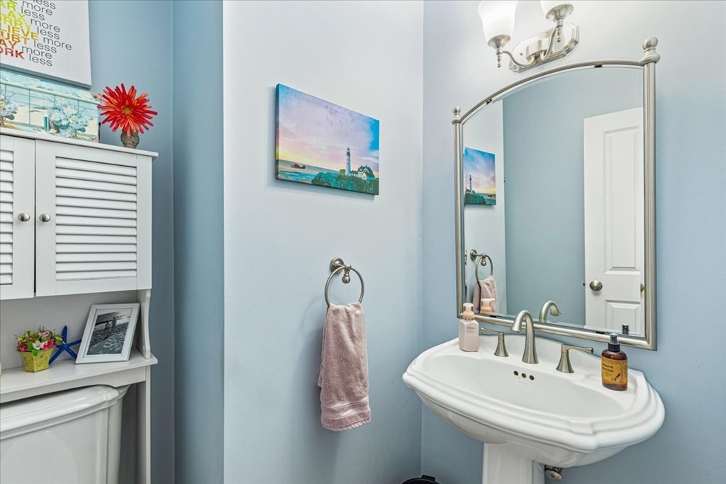 176 Marion Road Middleboro, MA 02346 - Photo 12 of 41 a bathroom with a sink and a mirror
