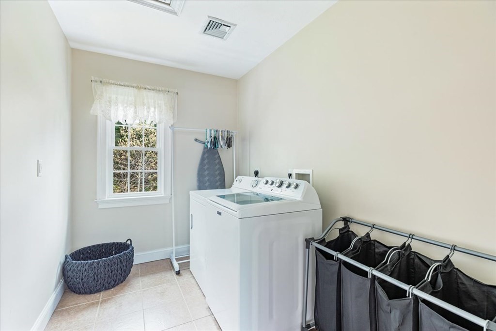 176 Marion Road Middleboro, MA 02346 - Photo 18 of 41 a utility room with dryer and washer