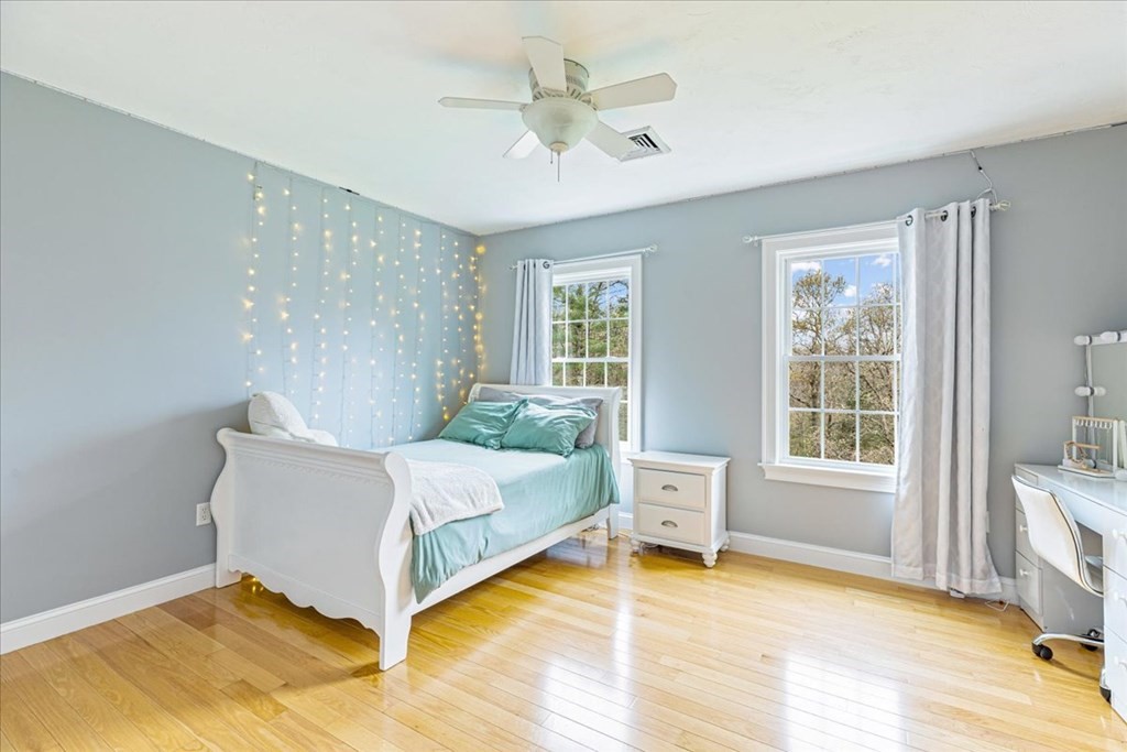 176 Marion Road Middleboro, MA 02346 - Photo 19 of 41 a spacious bedroom with a bed and a window