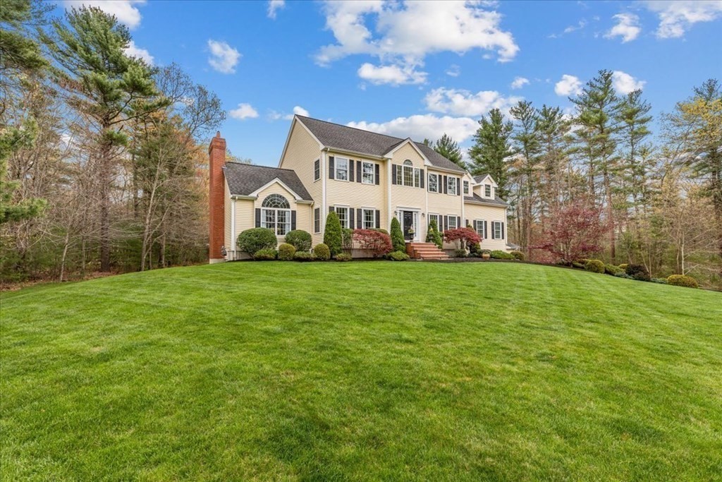 176 Marion Road Middleboro, MA 02346 - Photo 36 of 41 a front view of a house with a garden and trees