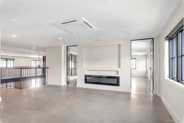 a bathroom with a double vanity sink mirror and shower