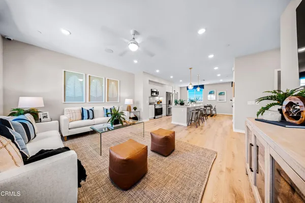 a living room with furniture and a couch