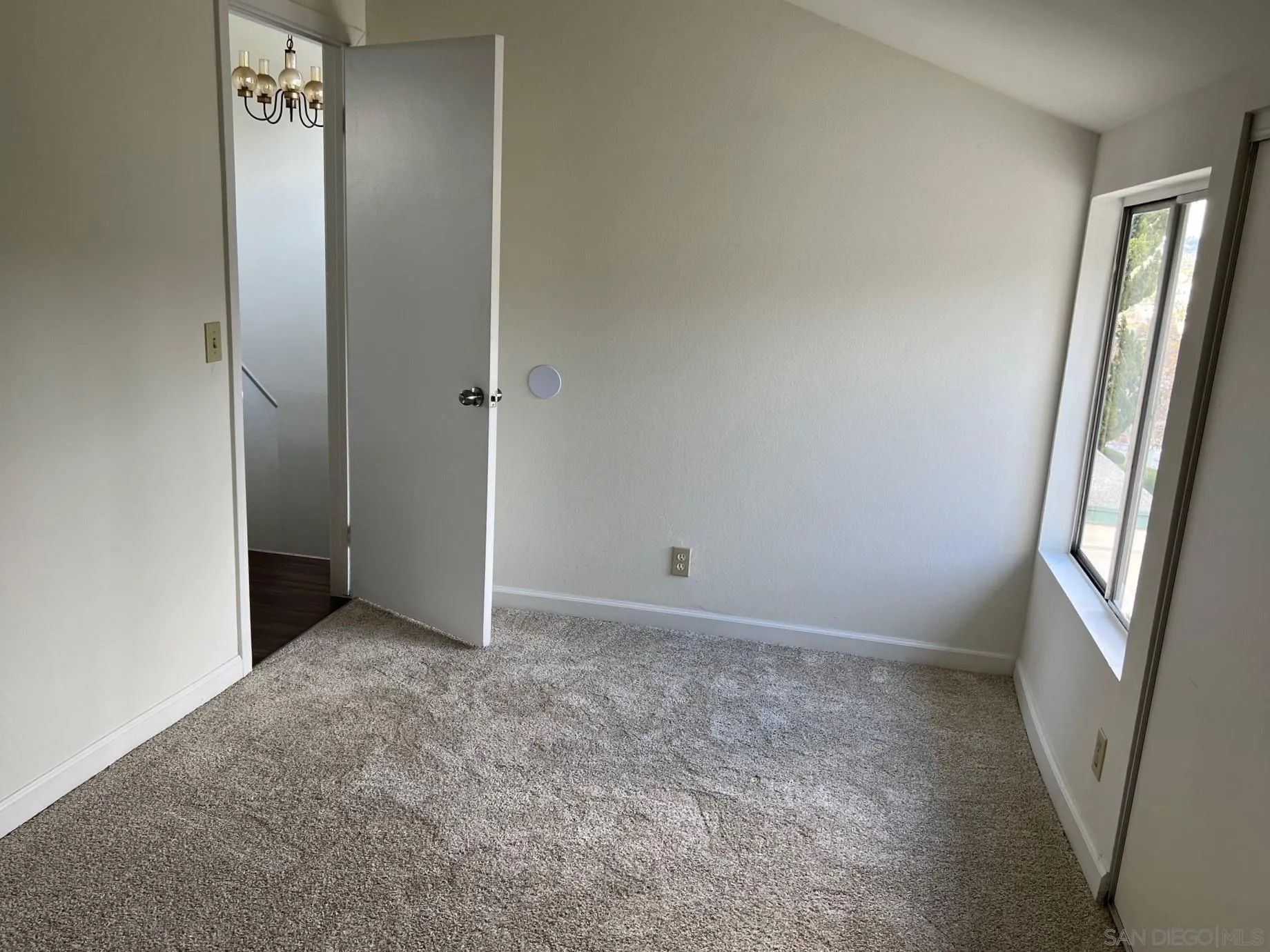 2018 Terracina Circle Spring Valley, CA 91977 - Photo 13 of 24 an empty room with windows