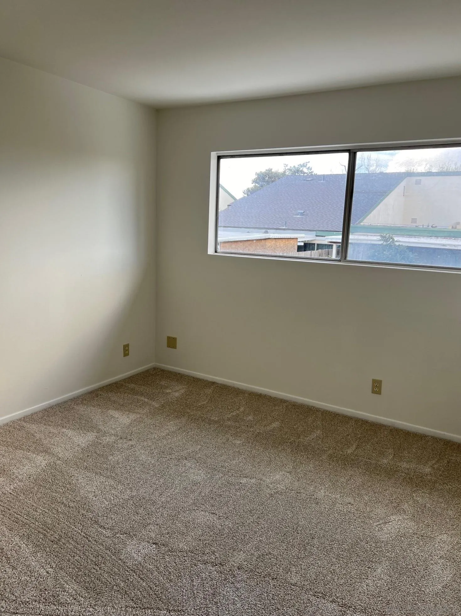 2018 Terracina Circle Spring Valley, CA 91977 - Photo 18 of 24 a view of an empty room with a window