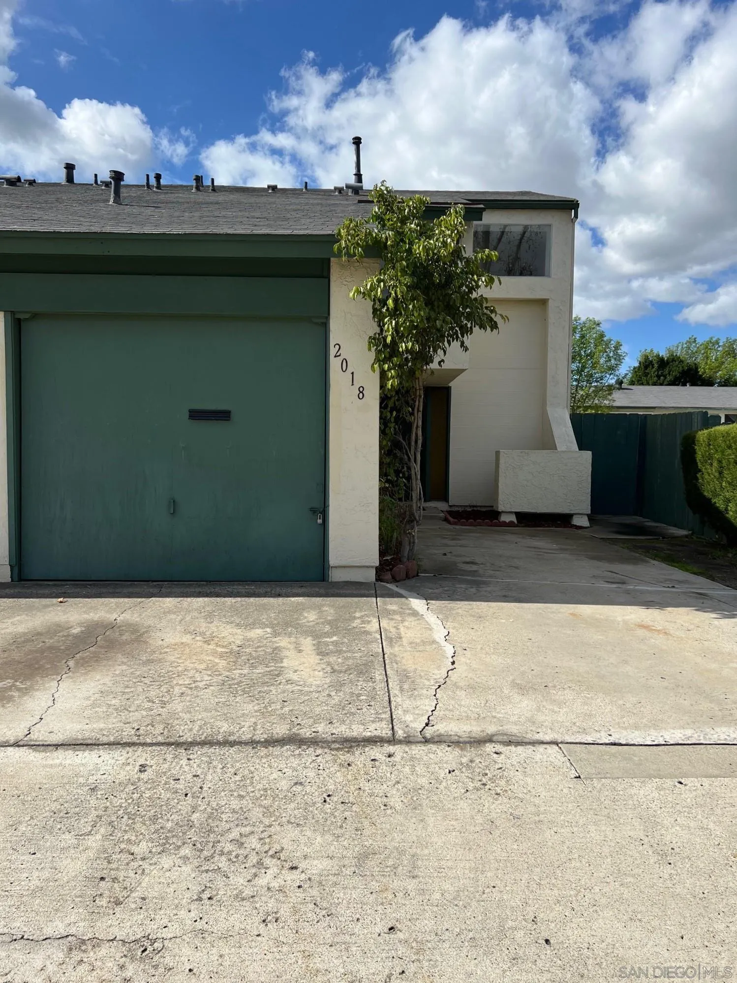 2018 Terracina Circle Spring Valley, CA 91977 - Photo 2 of 24 a front view of a house with plants
