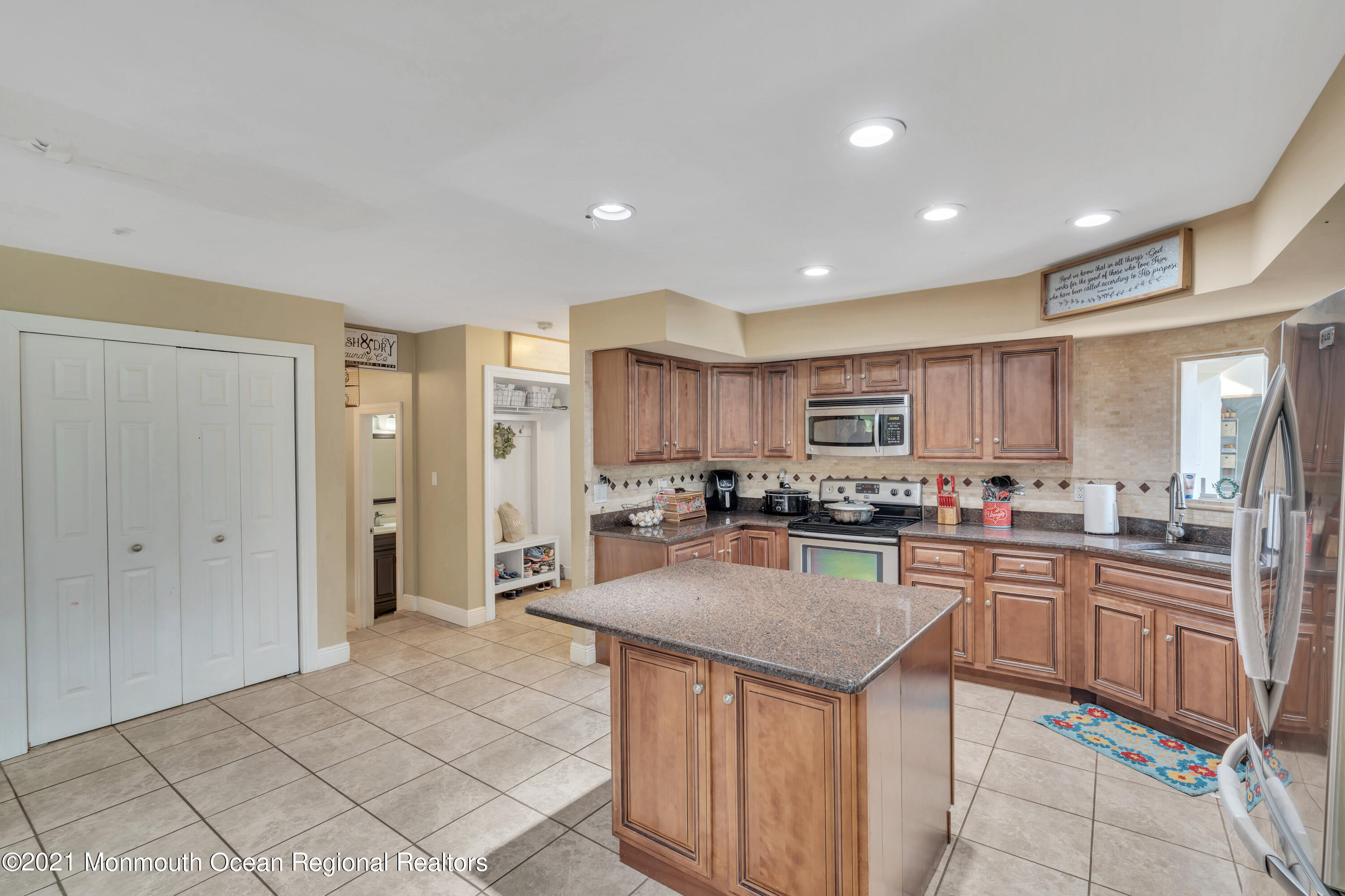 137 Leesville Road Jackson, NJ 08527 - Photo 22 of 80 a kitchen with stainless steel appliances granite countertop a sink and cabinets