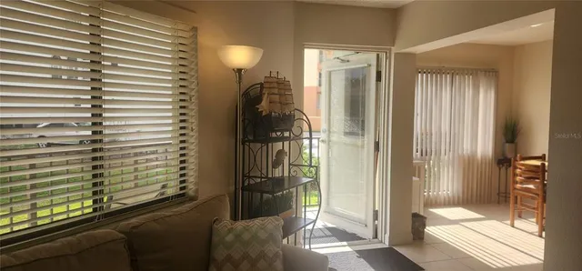 a view of a bathroom with a glass door