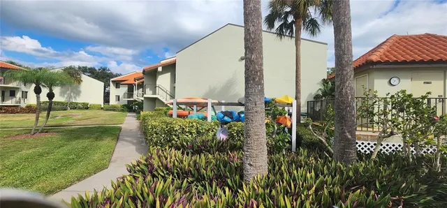 a view of a street with a building in the background