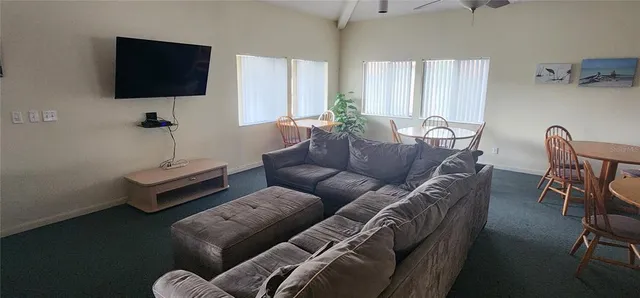 a view of a workspace with bookshelf