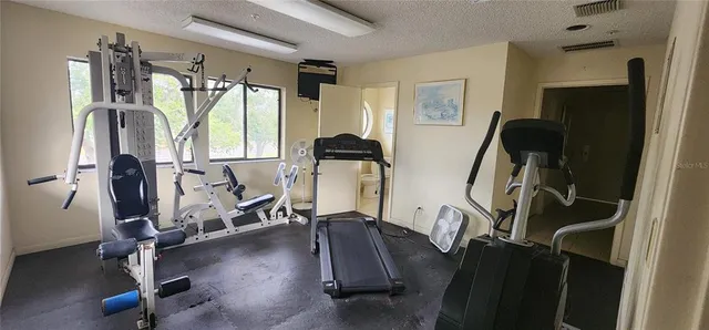 a view of a room with gym equipment