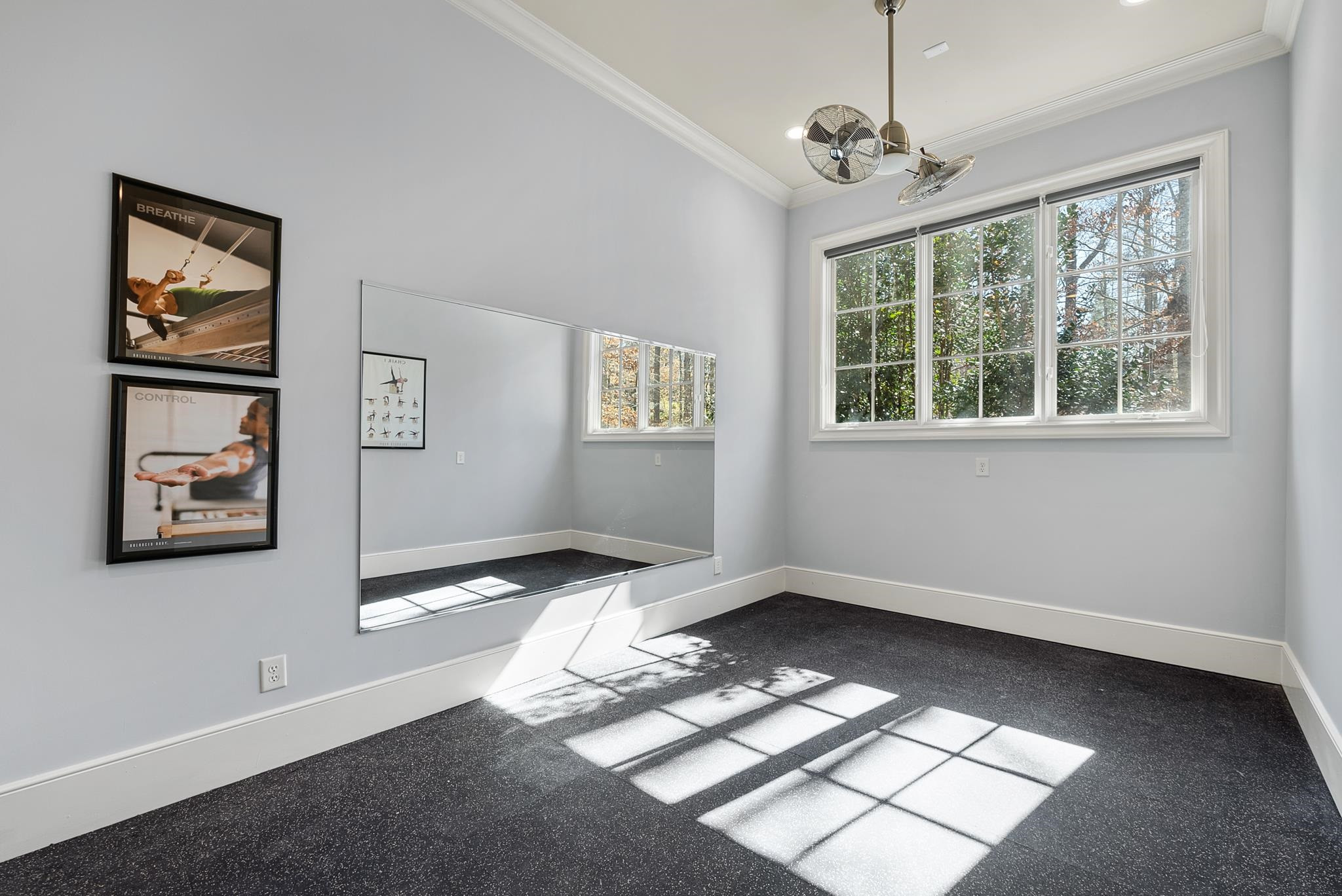 6009 Over Hadden Court Raleigh, NC 27614 - Photo 45 of 53 Rubber tile flooring, Mirrored walls, Private location connecting to lower garage & easy outdoor access. Exercise Room