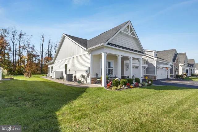 a front view of building with yard