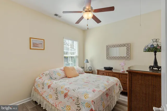 a bedroom with a bed and a table