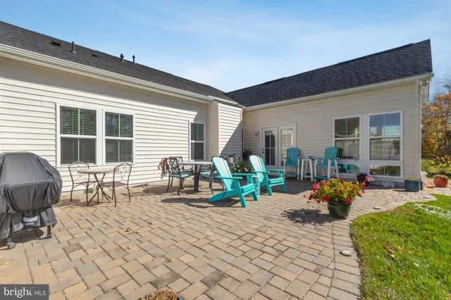 a backyard of a house with seating space