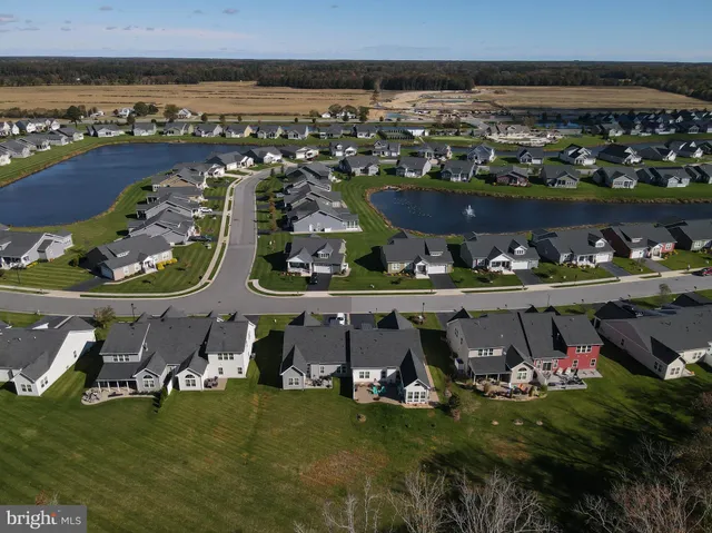 an outdoor sitting area with an umbrella