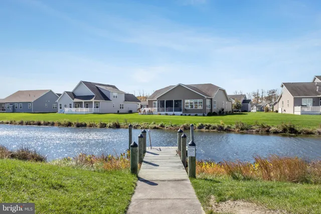 a aerial view of a house with swimming pool and garden