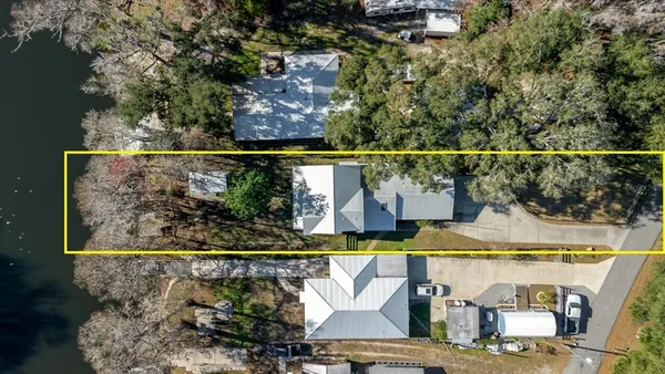 a view of swimming pool with a outdoor seating