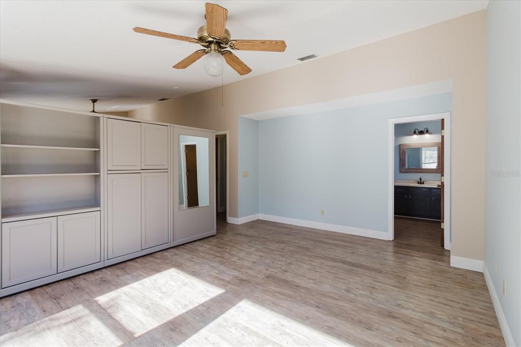 28330 Peterson Camp Road Brooksville, FL 34601 - Photo 43 of 81 a view of an empty room with a window