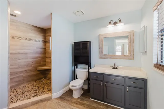 a view of a chairs and table in the patio