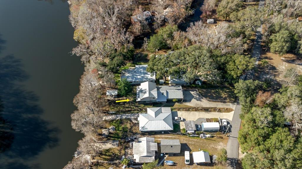 28330 Peterson Camp Road Brooksville, FL 34601 - Photo 79 of 81 an aerial view of multiple houses with yard