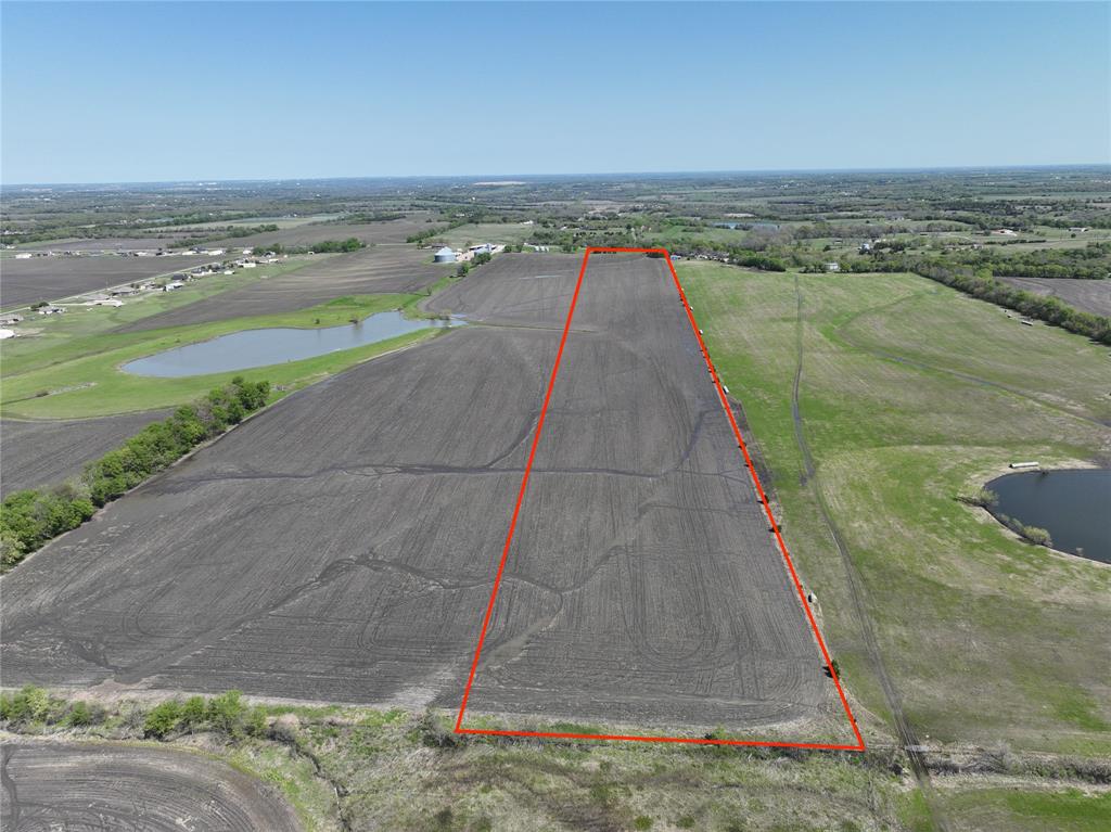0 Fm 902 Sherman, TX 75090 - Photo 2 of 10 a view of a lake with a big yard