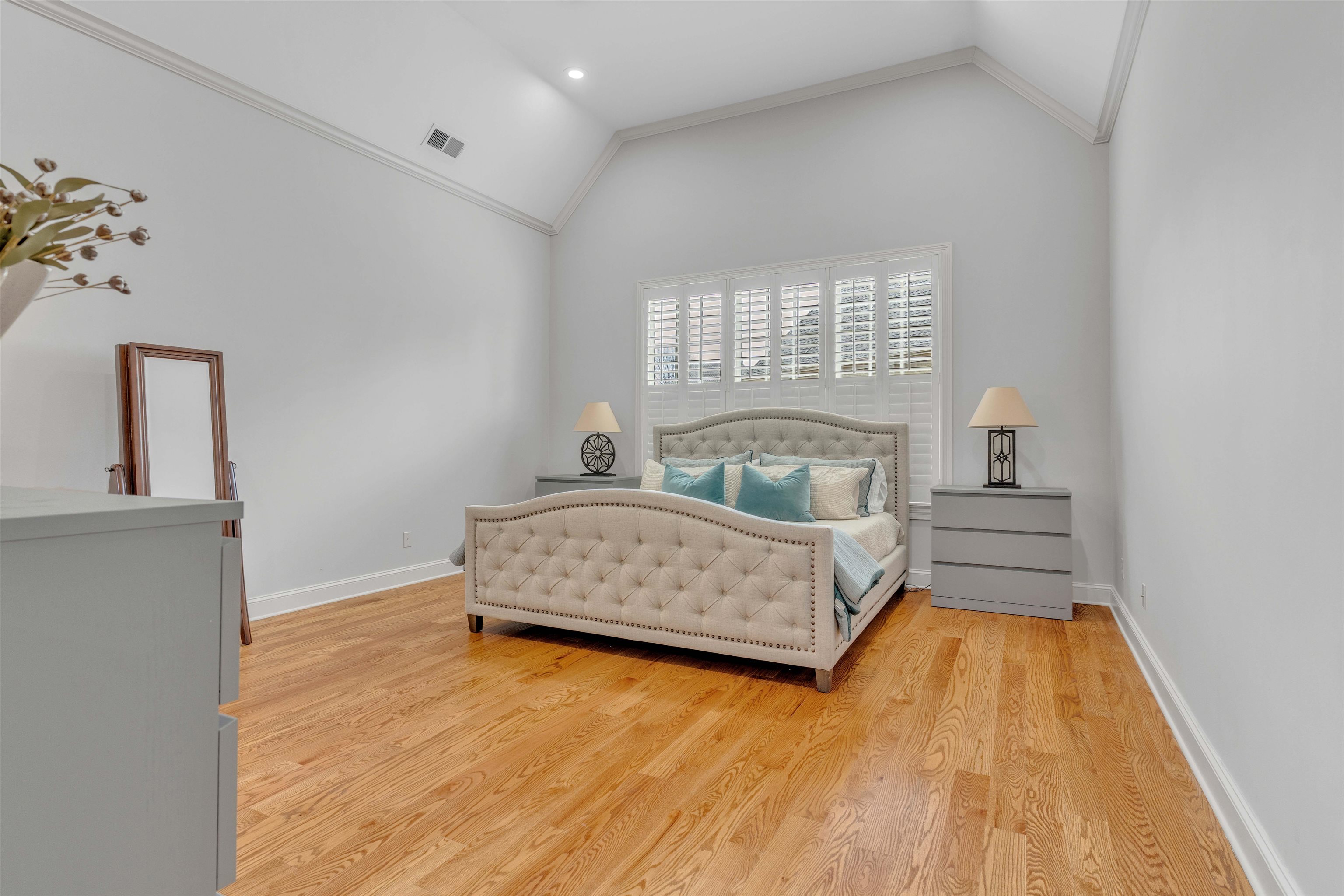 528 Althea Lane Collierville, TN 38017 - Photo 11 of 36 Bedroom with lofted ceiling, light wood finished floors, and ornamental molding