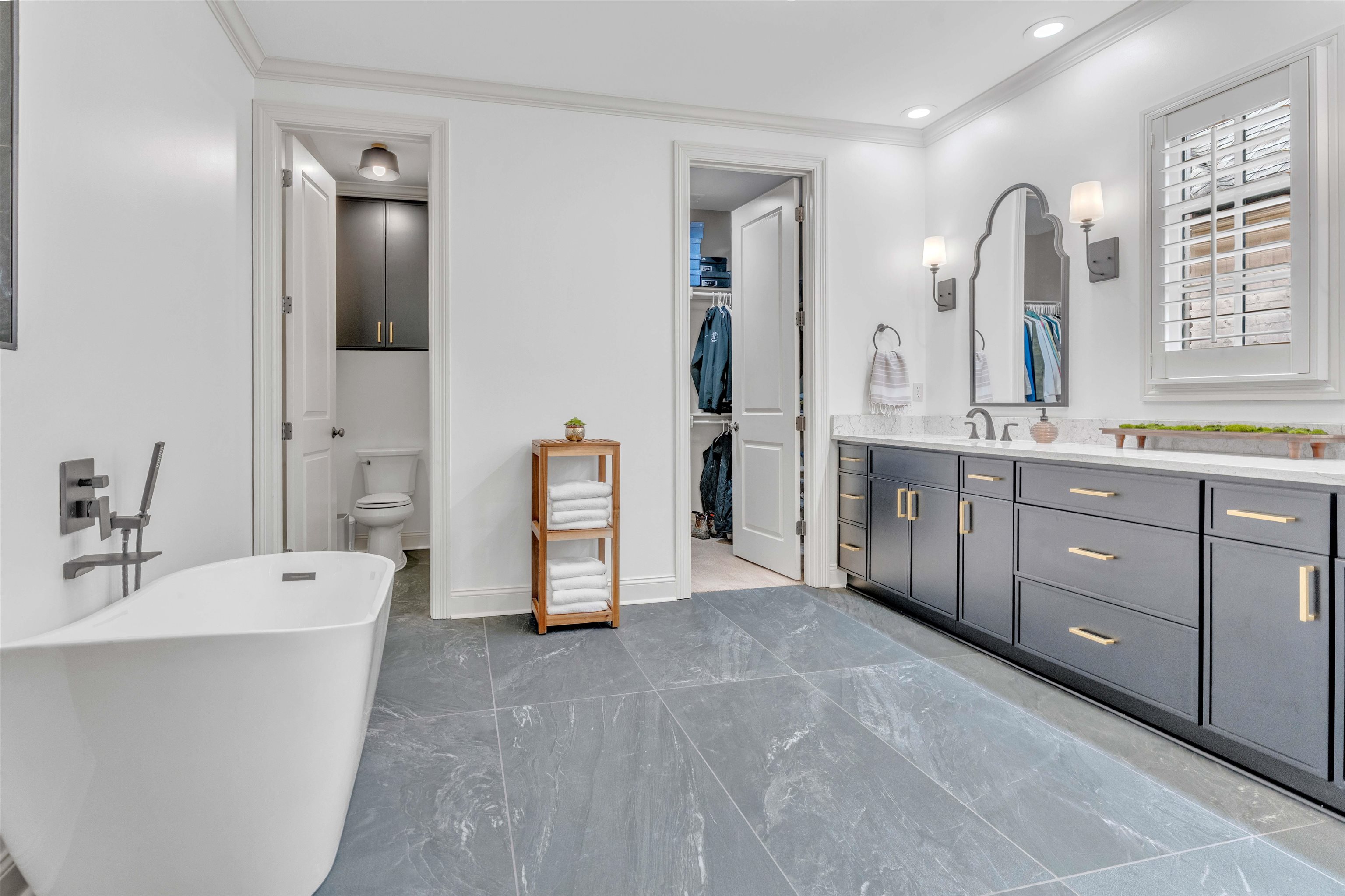 528 Althea Lane Collierville, TN 38017 - Photo 13 of 36 Bathroom with vanity, a freestanding bath, ornamental molding, recessed lighting, and a spacious closet