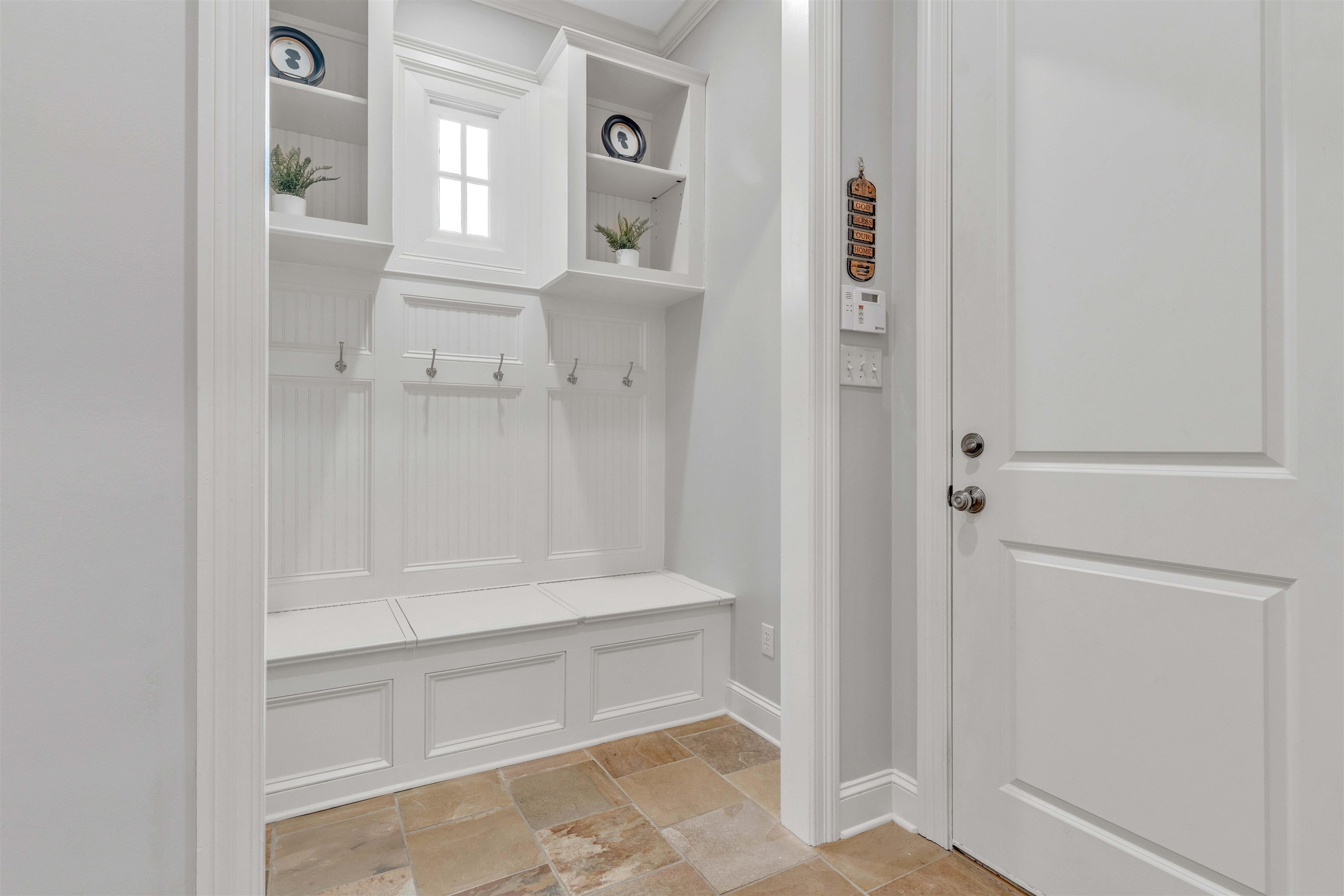 528 Althea Lane Collierville, TN 38017 - Photo 18 of 36 Mudroom with light stone finish floors and baseboards