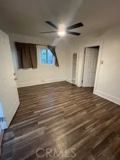 a view of a livingroom with wooden floor