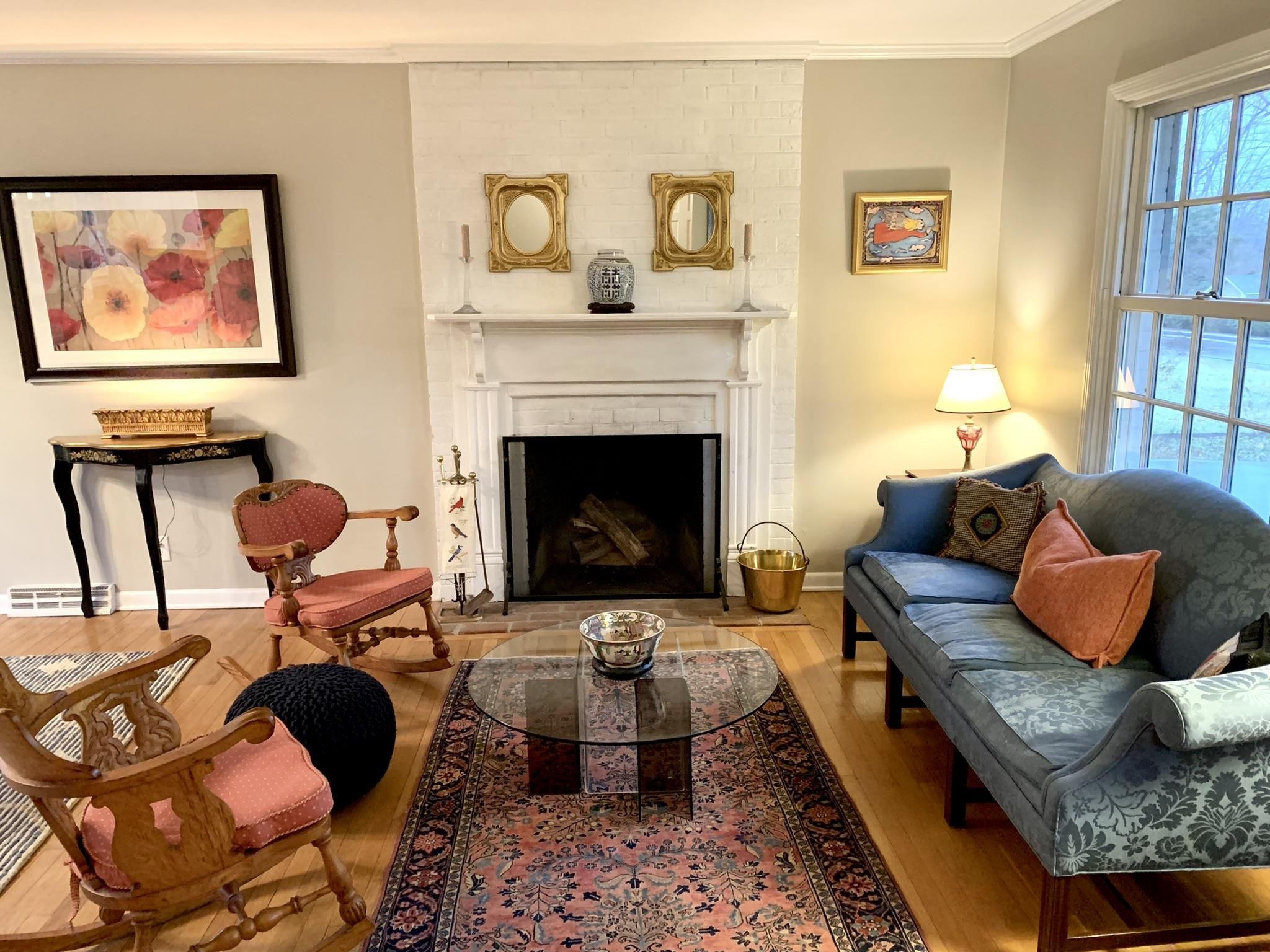 133 North Bennington Road Charlottesville, VA 22901 - Photo 6 of 45 a living room with furniture and a fireplace