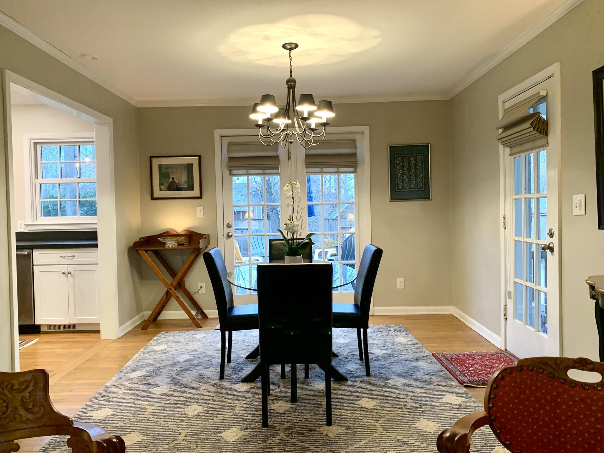 133 North Bennington Road Charlottesville, VA 22901 - Photo 8 of 45 a view of a dining room with furniture and a chandelier