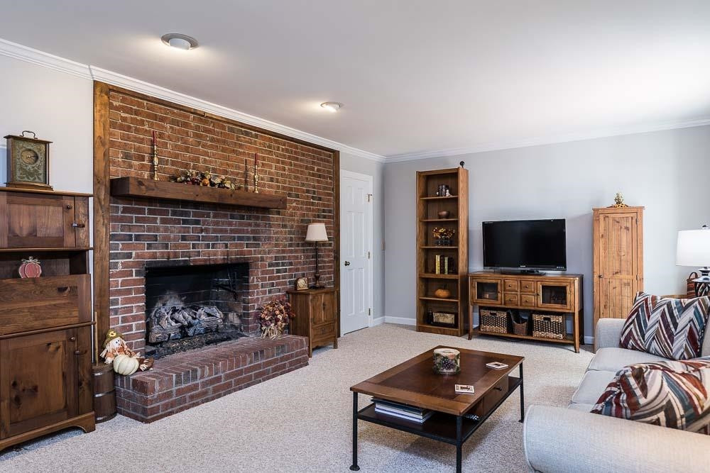 9513 Springdale Drive Raleigh, NC 27613 - Photo 11 of 30 Family Room with Gas Log Fireplace
