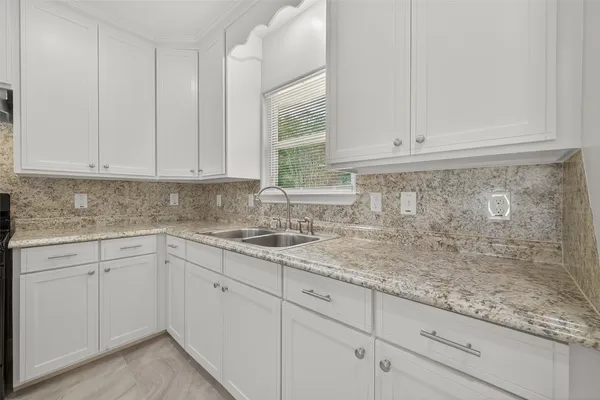 a view of a room that has a window