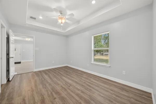 a bathroom with a sink toilet tub and shower
