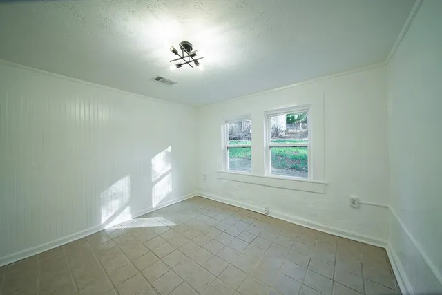 a view of empty room with a window