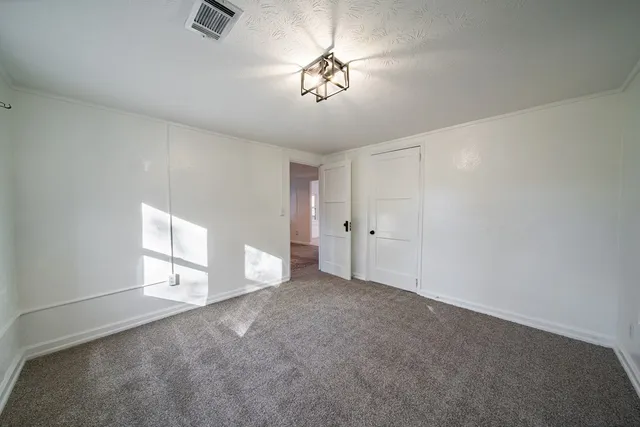a bathroom with a sink a mirror and a shower