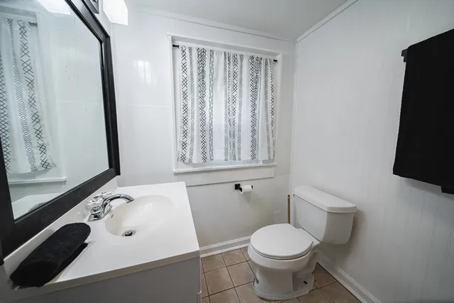 a view of a storage & utility room with a window