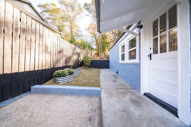 a view of a back yard of the house