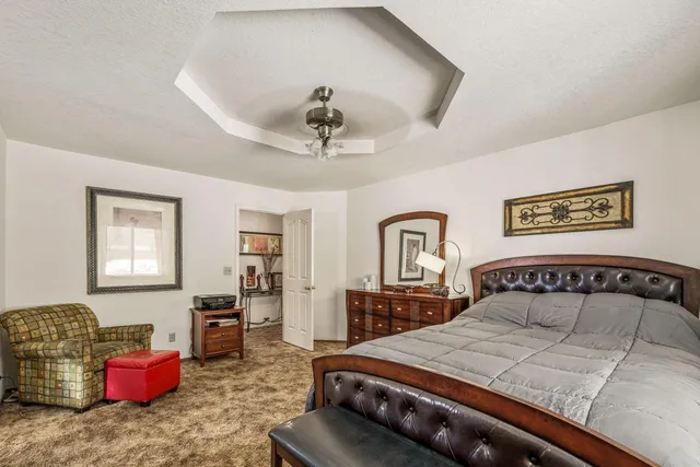 a view of a terrace with a table and chairs