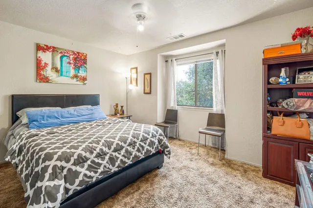 a view of a yard with snow on the road