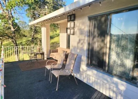 a view of a yard with an outdoor space
