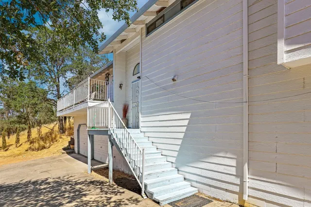 a room with a table and a mirror