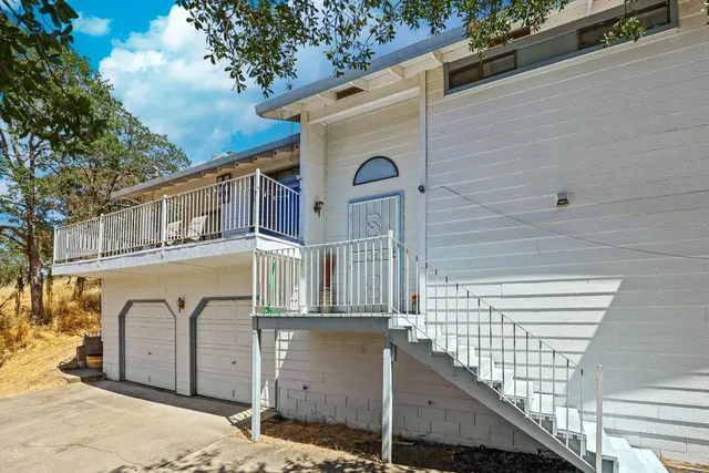 a view of a livingroom with furniture and wooden floor